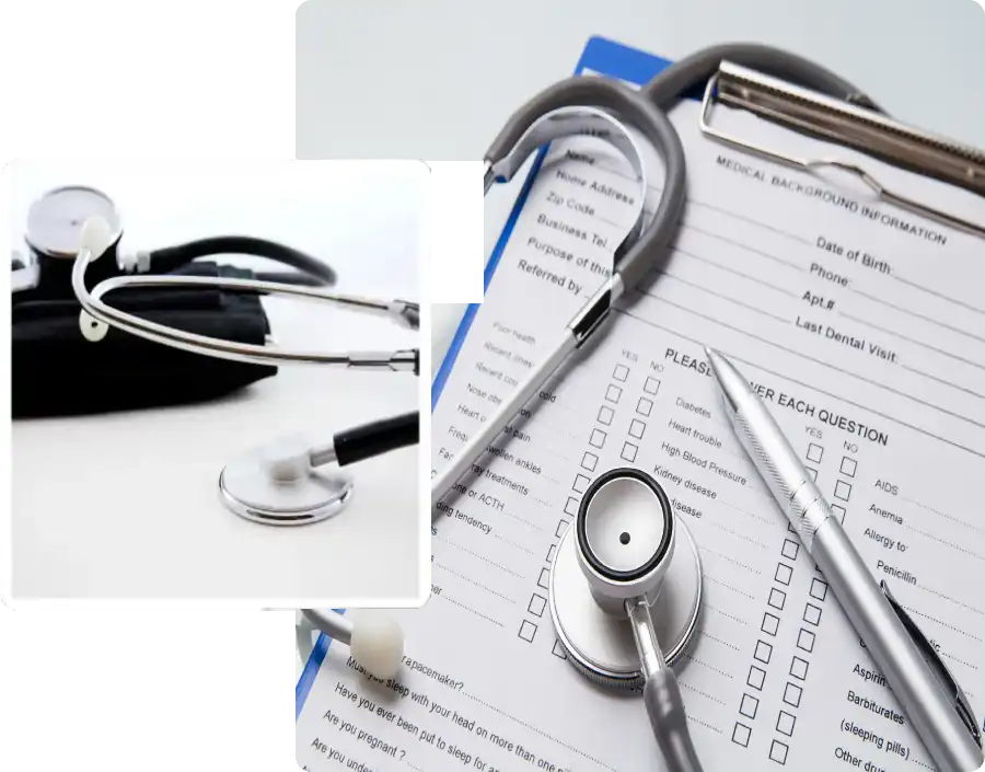 Stethoscope on medical forms and clipboard
